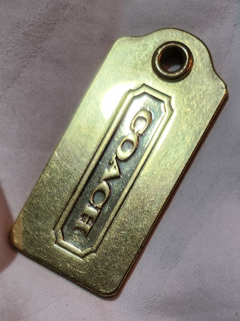 0049. 3 For $75 - Coach Gold Metal Tag Keychain Accent